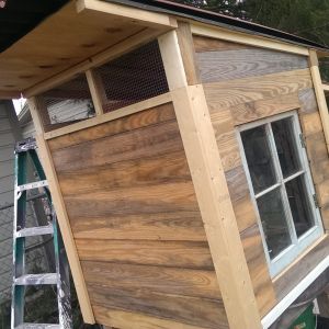 Ventilated roof line for our Texas weather. All the siding is tongue and groove pine siding that my hubby rescued from a dumpster on the UT Campus that had streamers and sequins stapled too it from a parade float that was torn down. My boys helped us prep it by pulling out staples and nails.