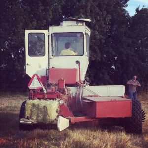 The kiddo learning to drive the hay baler.  He did a great job that day!