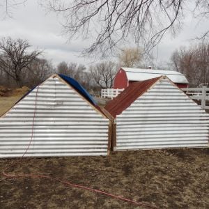 Back side of finished chicken tractors.  Eventually I will have a 5 gallon bucket on the back connected to a nipple drinking system.