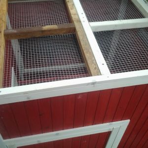 Loft 2x2 frame for added support with hardware cloth for security and ventilation as well as hold heat lamp