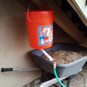 Watering system my husband made after I found this tutorial....http://sharidenise.hubpages.com/hub/Watering-Chickens