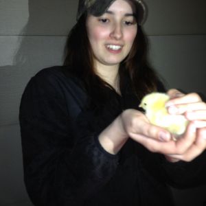 My daughter holding her first chick.