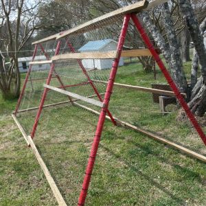 My daughter's old swingset. I turned it into a a "minicoop" to use as a grow-out pen for the bigger chicks before they get to go out to the big coop.