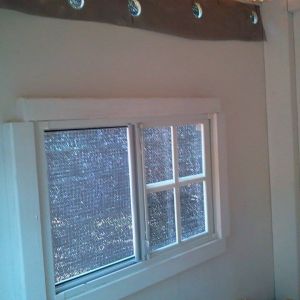 *window with vent holes above
