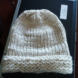 Honeybuns hat after spinning the fibre