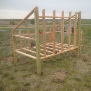 Side angle view after the front and back walls of the coop were erected.