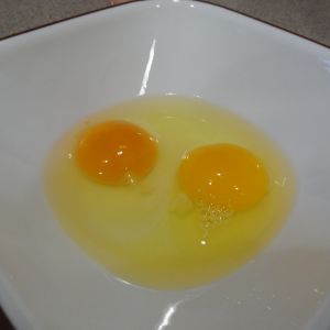 Store bought (right).  Backyard egg (left).  But you already knew that just by looking.