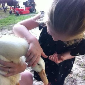 Cheyanne loving on her duck "Quack"