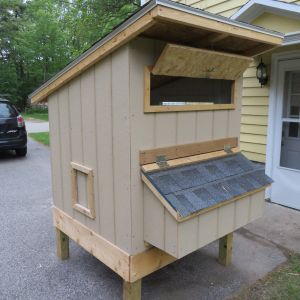 Coop windows are completed, trim is added, and the nest box is finished. The nest box is 3' x 1' and has a hinged roof.