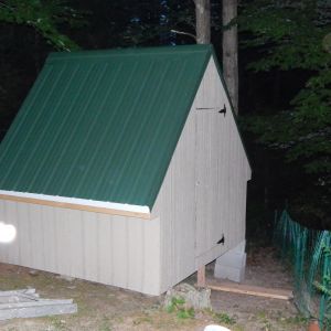Door is on with a slide bolt latch. I will finish the floor up tomorrow and I think the girl might be sleeping in their new home tomorrow night. Going to finish the final touches with the girls under foot. a vent window needs to go above the door.