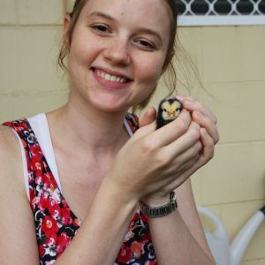Elizabeth and a baby chick.
