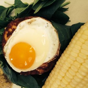 Pan fried buff Orpington's egg ( medium rare) on top a wild salmon patty.