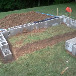 Foundation started.  It's on a hillside, so there are 3 rows of cinder blocks.