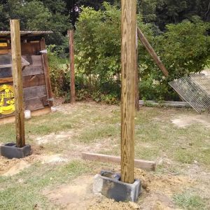 Used cement blocks to hold my poles level