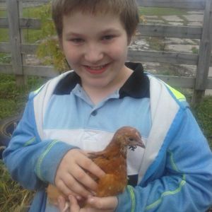 my grandson Chris and his chick chocolate