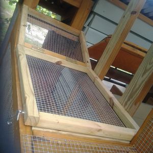 A door to access ramp and make cleaning easier.