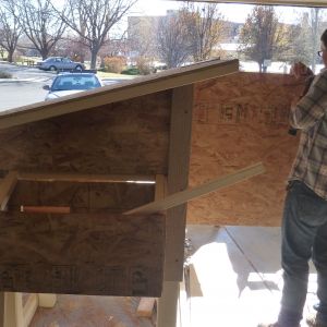 Brother-in-law (carpenter) helping us learn how to build a coop