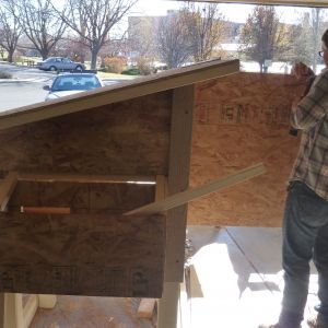 Brother-in-law (carpenter) helping us learn how to build a coop