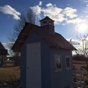 Finished shingling and adding the cupola.