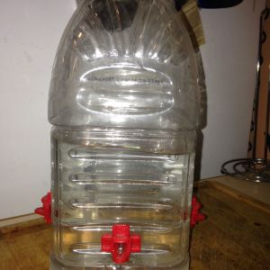 First waterer I set up in the chicks brooder at two weeks, we then moved them outside and for confidence, I made a new one with a two gallon bucket.