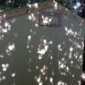 7/20/15  My father in law created a vent up high where the roosting bar is will be so the chickens can stay cool at night.  North Texas summers are brutal with most of July and August in the 100's