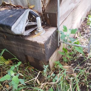base lap joint and bolt

tarp wrapped around 2 x 4 and screwed down