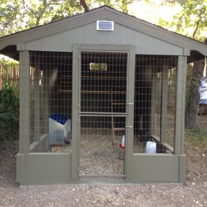 Front with Dutch door and solar panel for automatic chicken door.