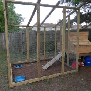 The chicken coop my husband and I built before we installed the tin roof.