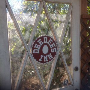 I had had this great old door for a few years, also a free Craigslist find. It became the door to the chicken yard.
