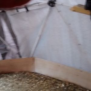 this is the pony wall we put up to keep chickens in and predators out, I am buying burlap to add to the walls for warmth