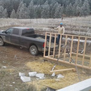 My DH building our new duck house.