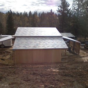 a view of the back of the hay shed