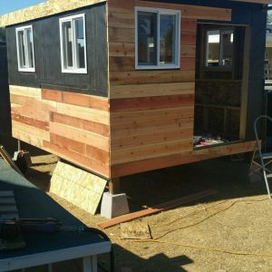 waterproofing then redwood siding