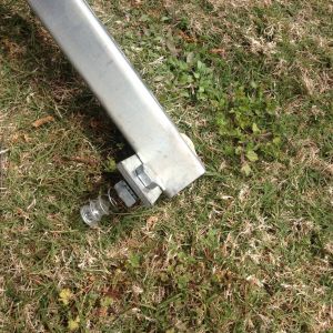 It has some kind of spring that unscrews and unbolts.