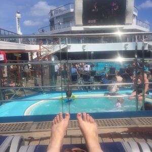 Lounging by the poolside. Lido deck.