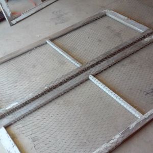 I built it from a set of old window frames that I had laying around. The frames were 2 foot wide and 4' long. I covered each pair of them with a 4 foot wide piece of chicken wire.