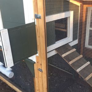 We can open and close the coop door without opening the enclosed run. I can easily close off the coop if I need to get inside while the girls are safely locked down below.