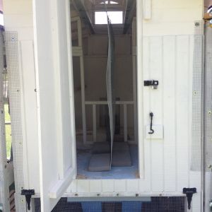 It is divided in half with hardware cloth.