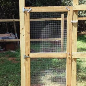 door is complete with hardware cloth and latch