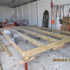 adding the 14 gauge 1" by 1" fencing for initial floor covering (poop falls through)