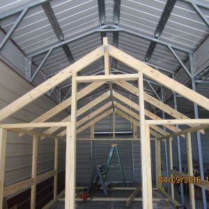 Rafters up and connected to ridge