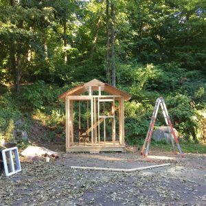 Putting the roof on was a pain in the butt because I wanted the front to overhang by a foot.  I'm glad I fought for it thought because it's a nice cover when it's raining.