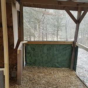 Temporary bedroom wall with a tarp