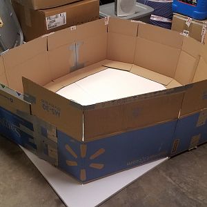 Self-made brooder: Cardbord boxes, Strofoam covered with a Tarp