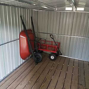 Wheelbarrow and Garden cart inside