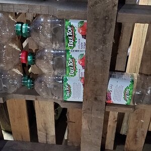 Closeup picture of the juice bottles in he pallet