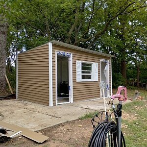 Siding up, shutters on