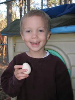 17624_connor_holding_first_egg.jpg