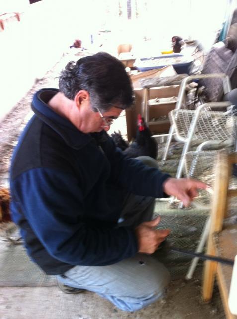 41679_johnrepairingbench.jpg