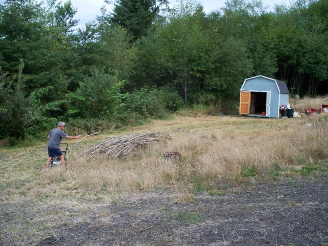 50801_mowing_in_front_of_the_barn.jpg
